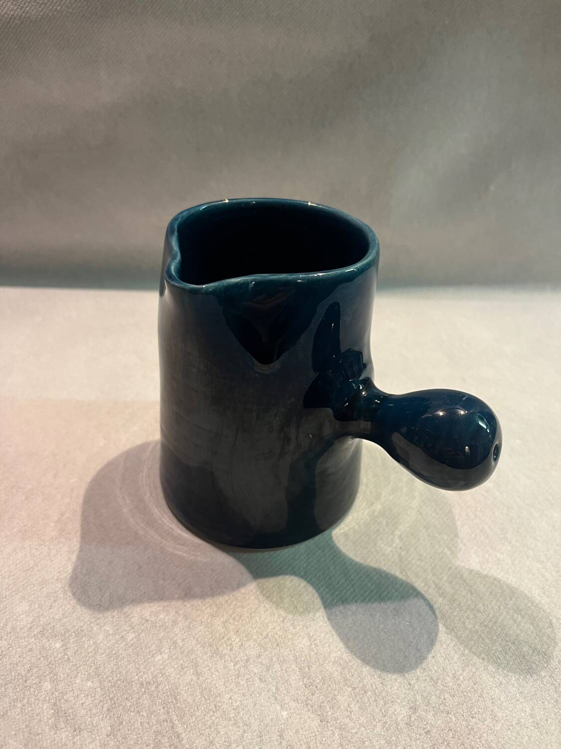 Blue ceramic milk jug