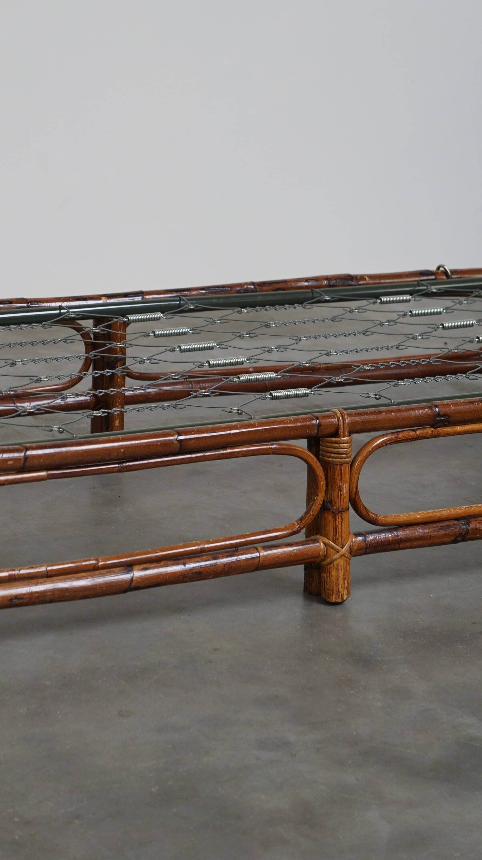 Vintage bamboo/rattan manou bed from the 70s with original spiral base