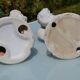 Pair of "cherub" candle holders in plaster