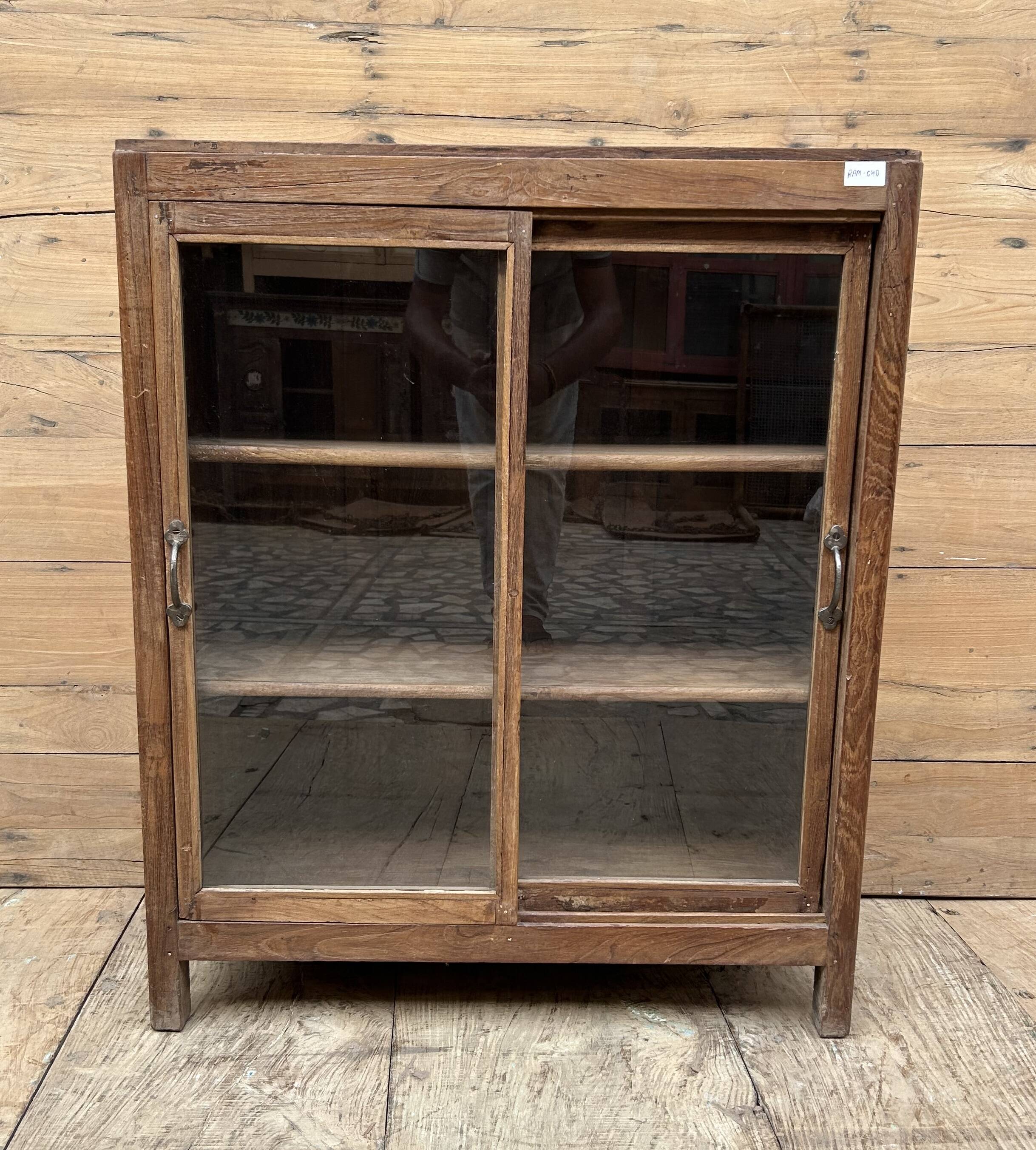 glass-fronted buffet in Burmese teak