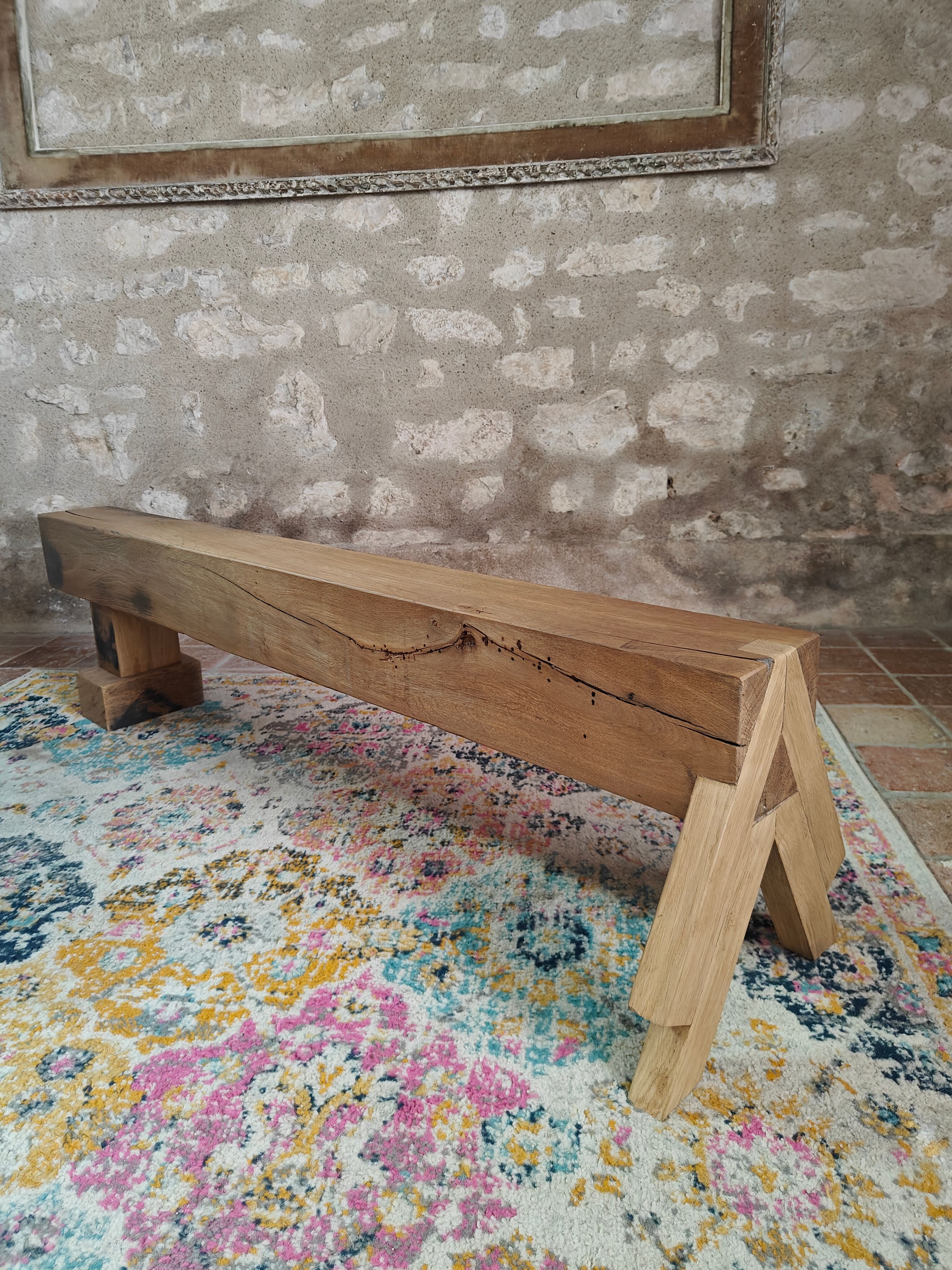 Solid oak bench with asymmetrical legs