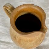 Light-turned sandstone pitcher