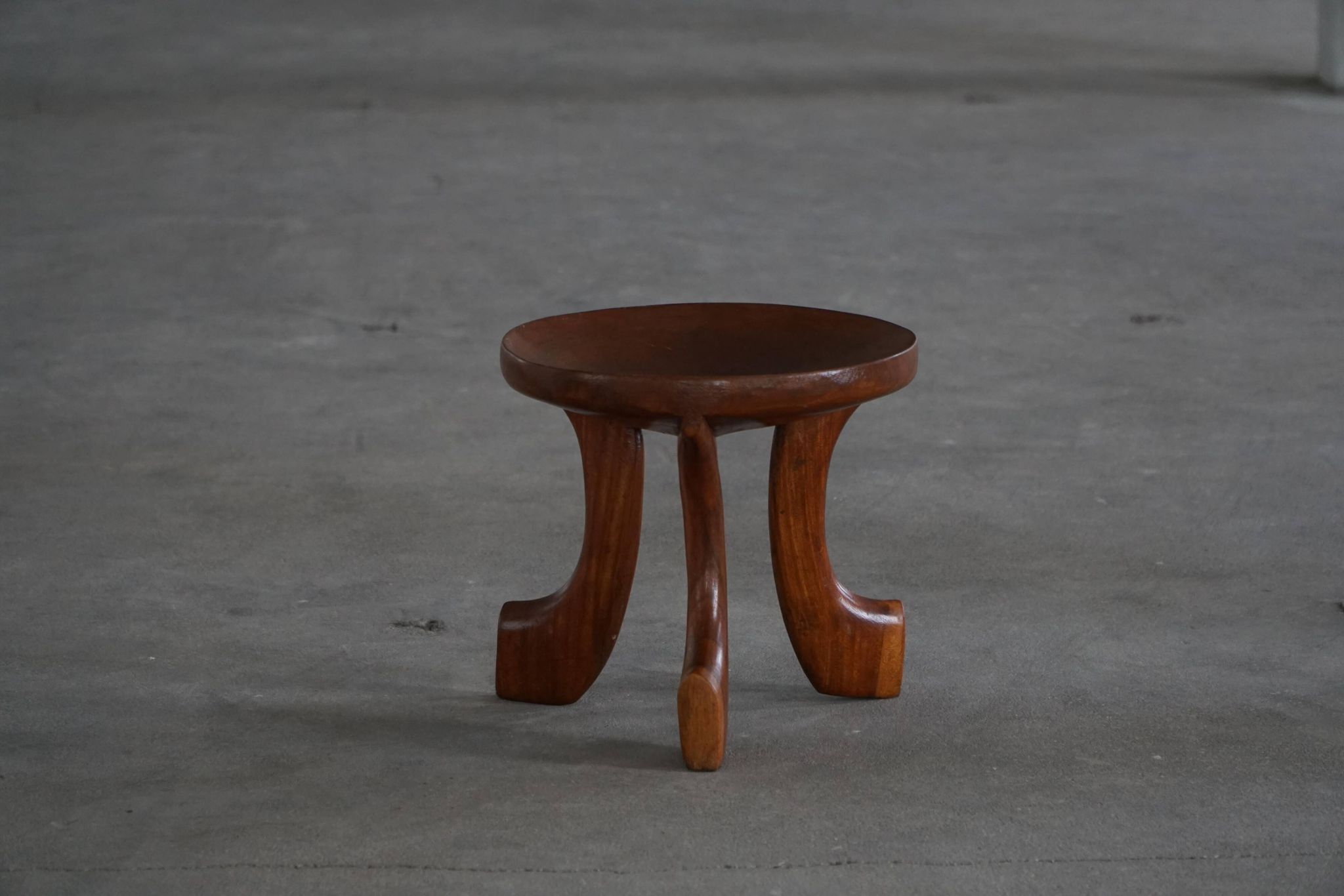 Oromo stool from mid-20th century Africa, hand-carved wood, tribal style.