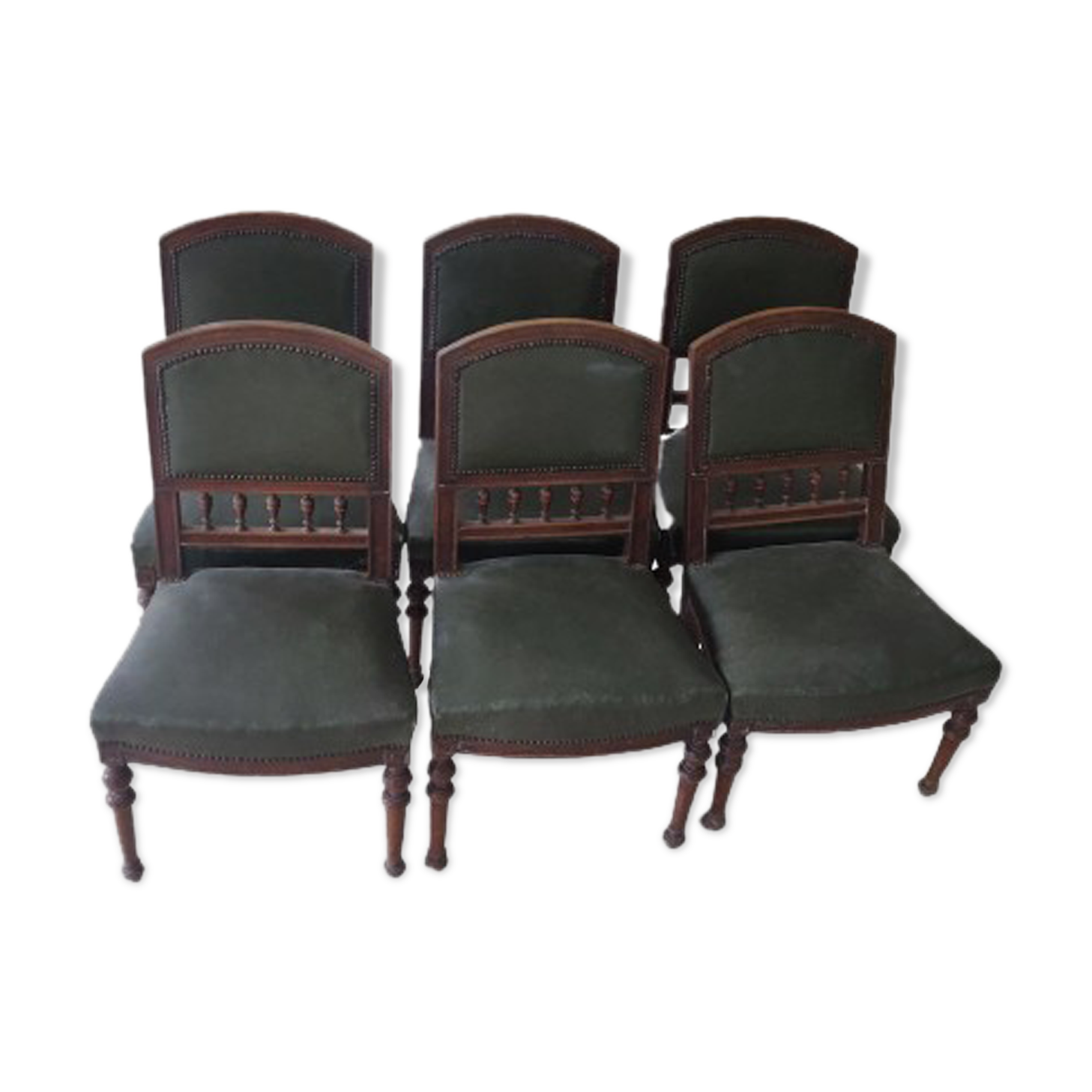 6 English style mahogany chairs covered with imitation green leather.