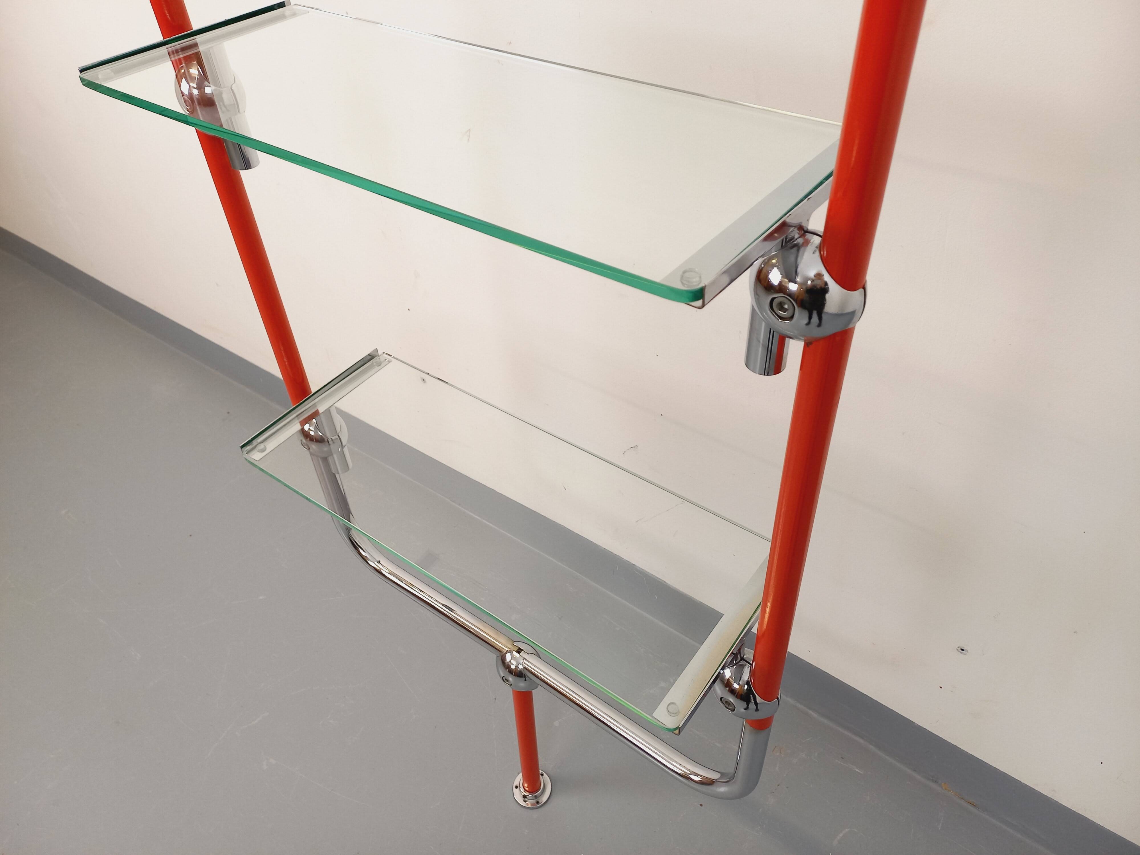 Modular bookshelf in vintage Bauhaus style, red metal, chrome.