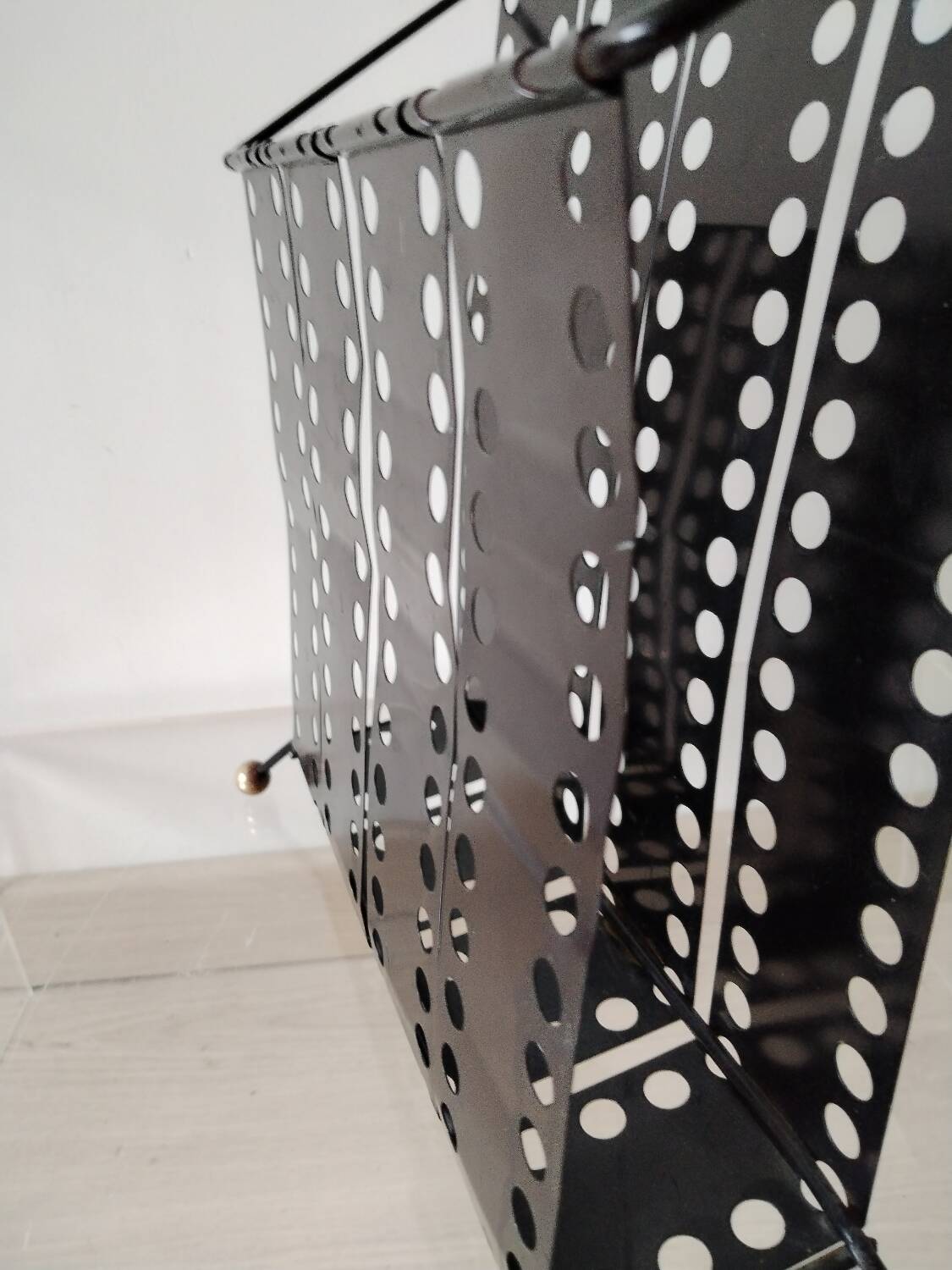 “Santiago” magazine rack in perforated sheet metal Mathieu Mategot 1950s
