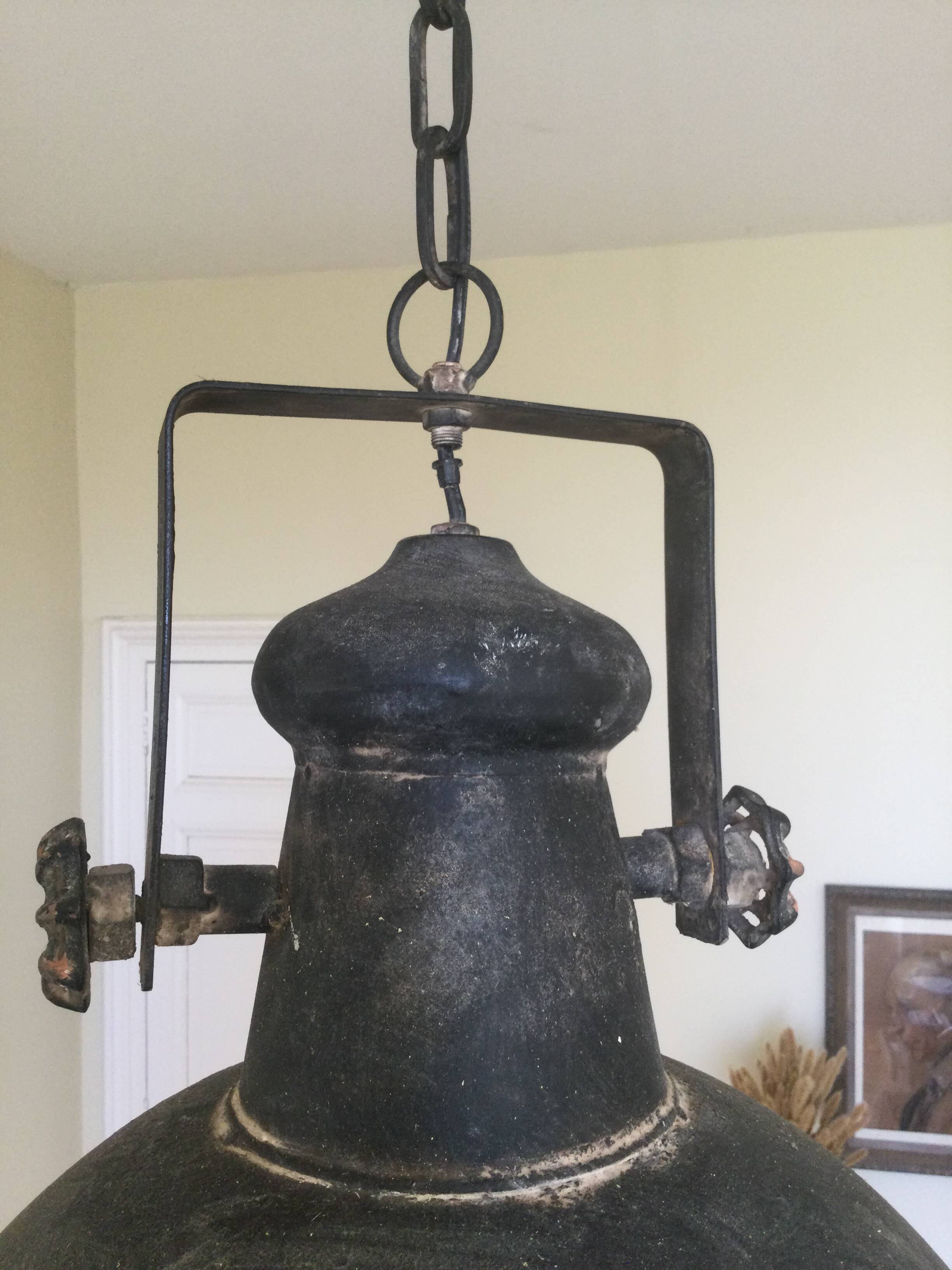 Large round sheet metal pendant light