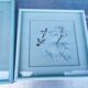 Two vintage paintings made with feathers, hummingbird motif