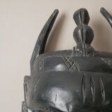 Decorative mask hand carved in tribal ethnic painted wood