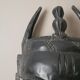 Decorative mask hand carved in tribal ethnic painted wood