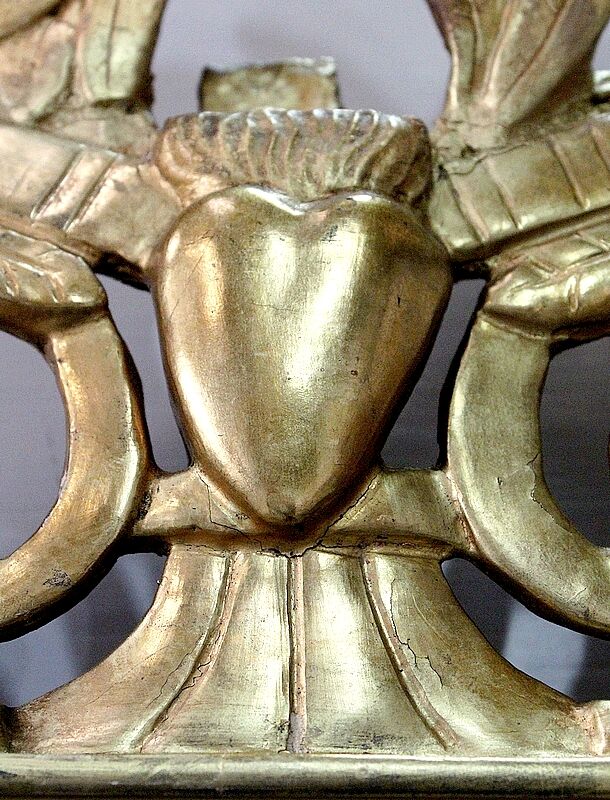 Miroir en bois doré, style Louis XVl, début XXe