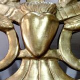 Miroir en bois doré, style Louis XVl, début XXe
