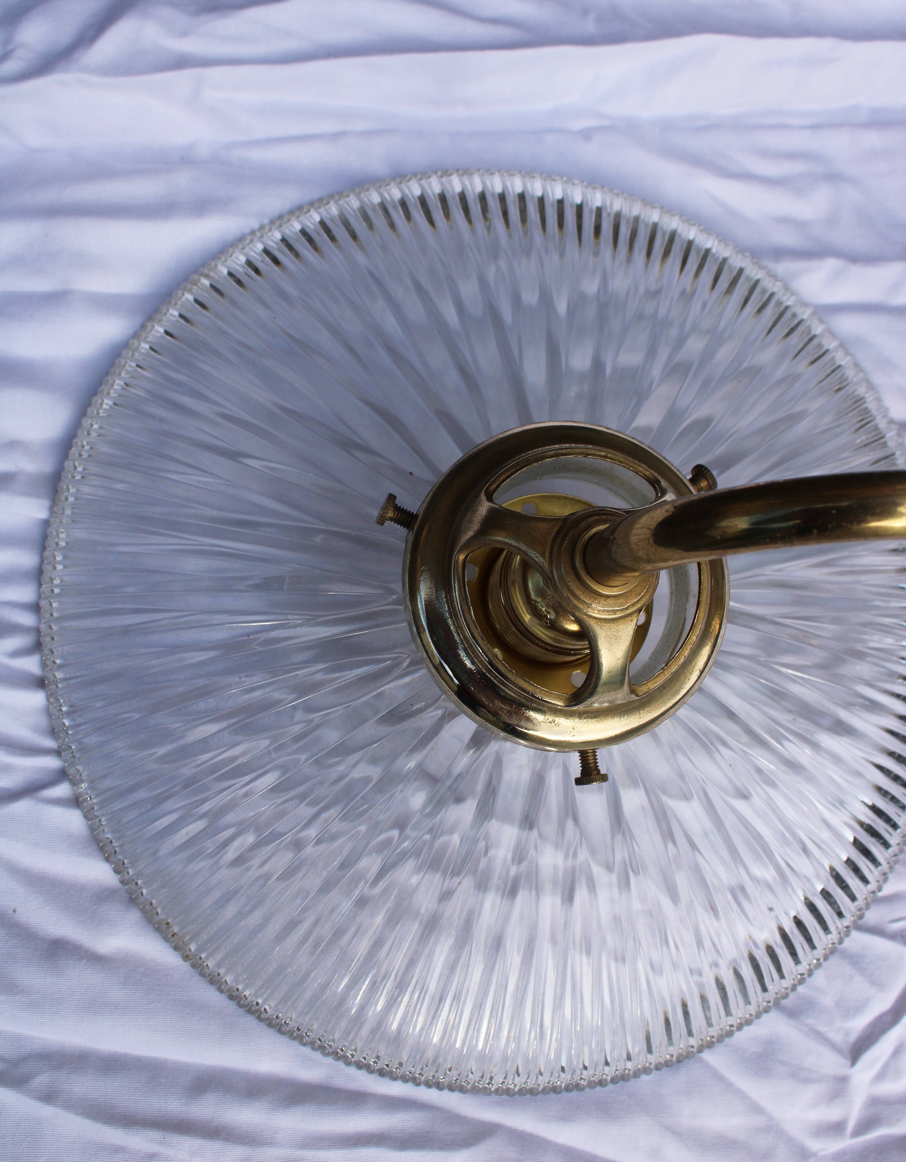 Holophane glass and brass wall light