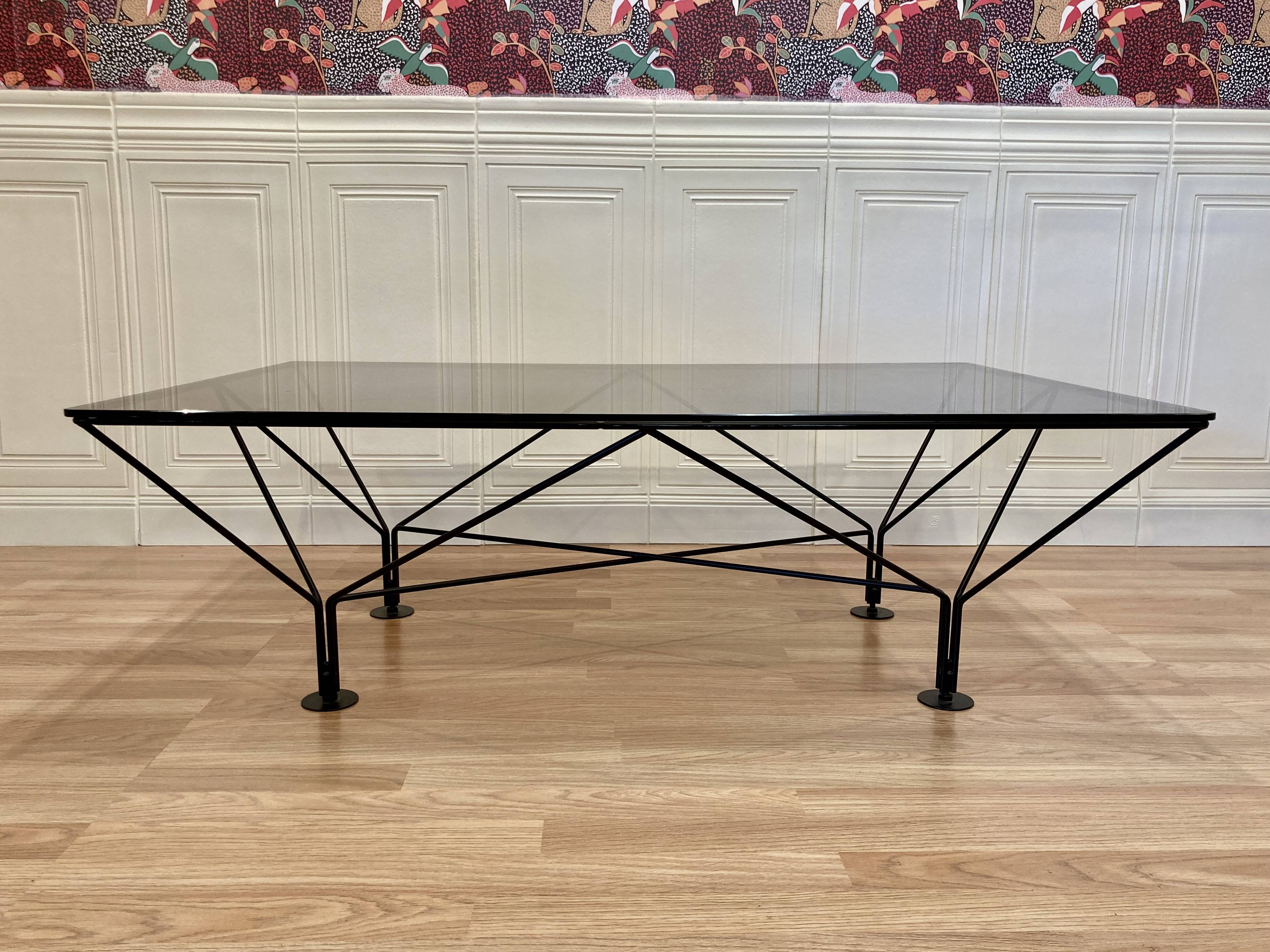 Designer glass and metal coffee table.