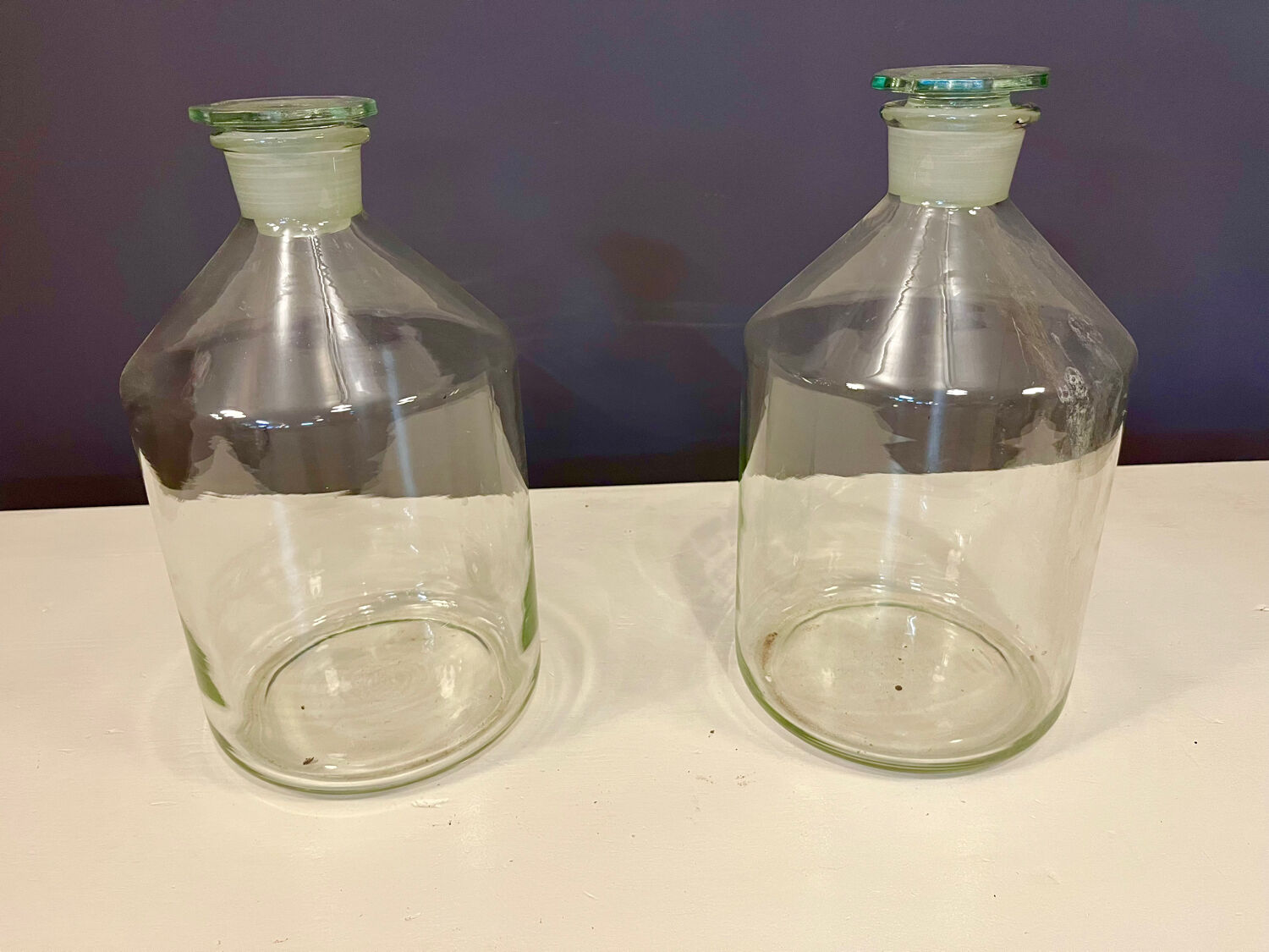 Pair of old factory perfume bottles