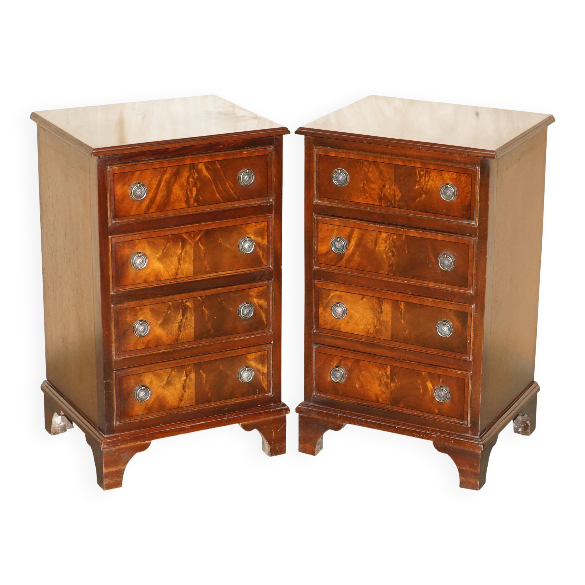 Pair of French polished flame mahogany chests of drawers.