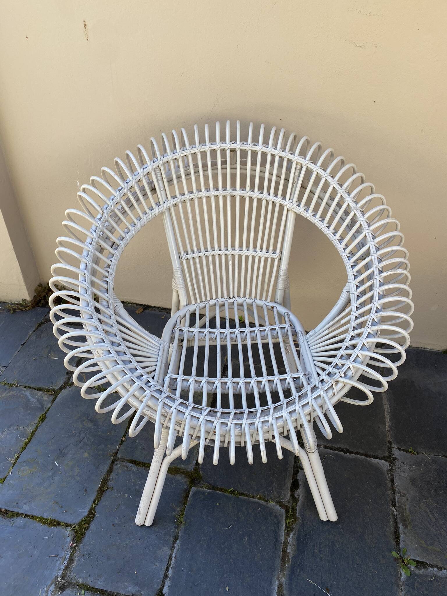 Vintage white rattan armchair
