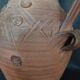 Vintage pitcher with a signature to identify.