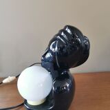 Vintage 80s lamp in the shape of a woman's bust made of black ceramic.
