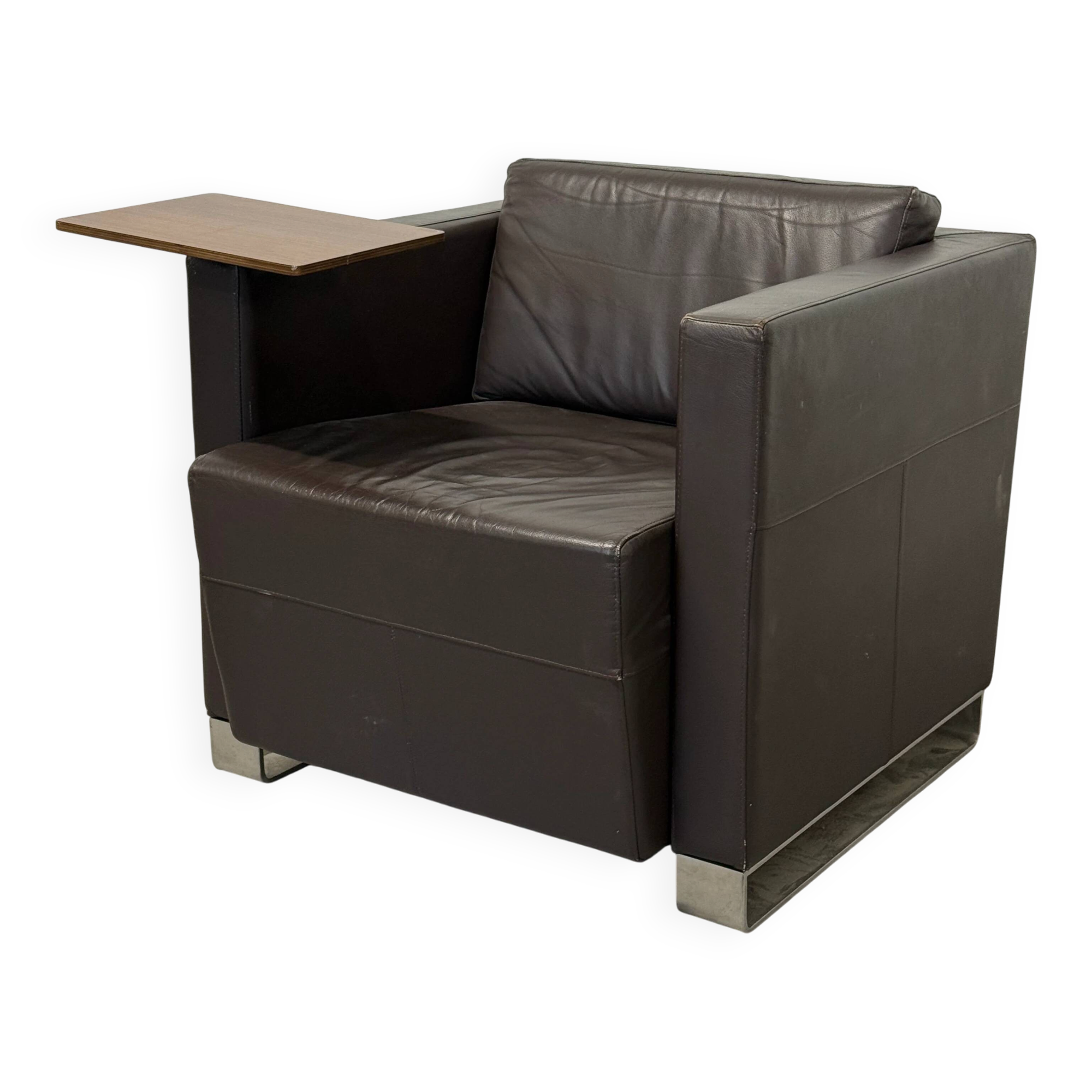 Vintage brown leather club armchair with a swivel side table.