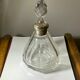 Antique crystal bottle with art deco hallmarked silver neck with facets