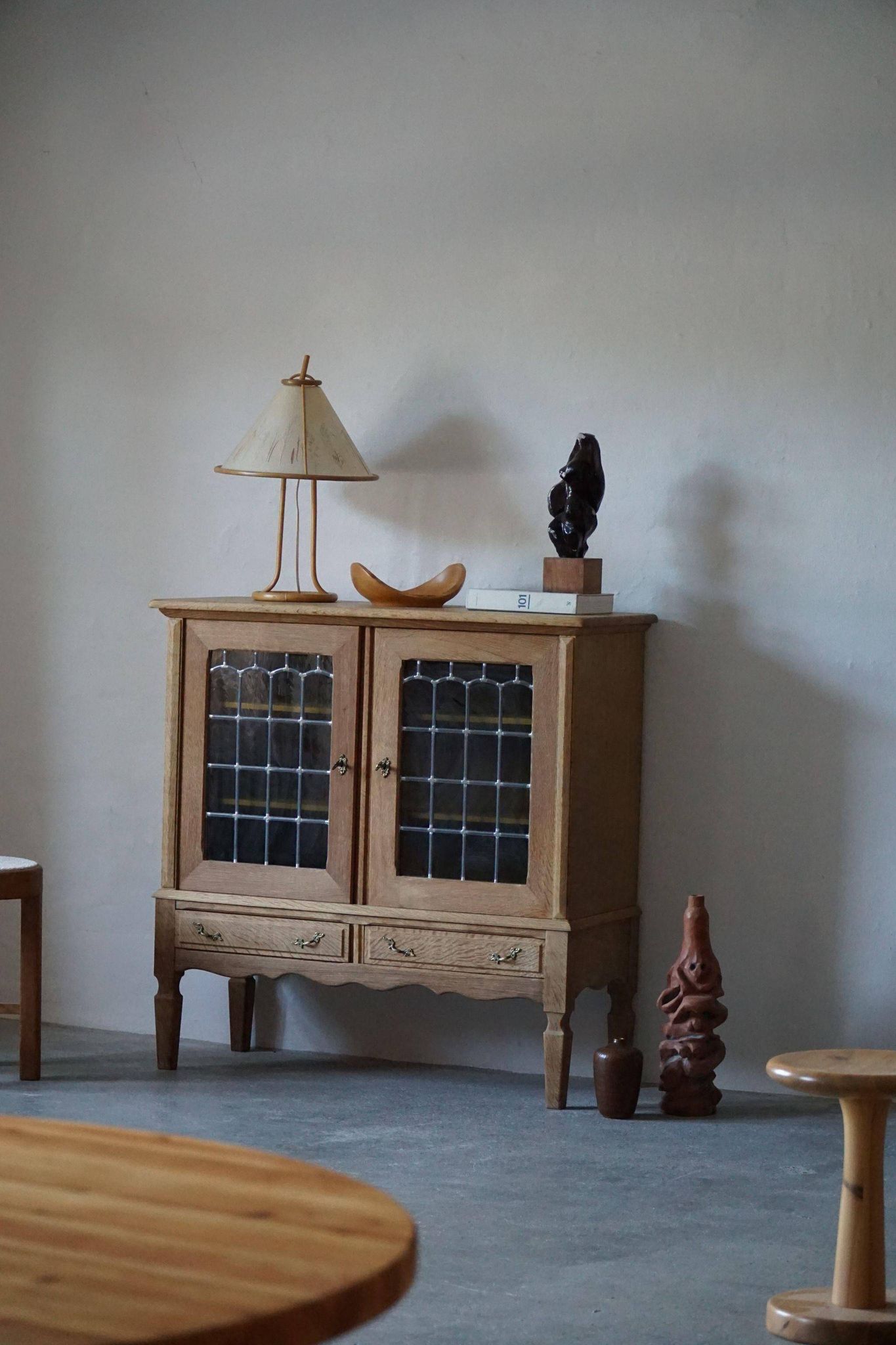 20th-century mid-century solid oak sideboard with glass front, by a Danish cabinetmaker.