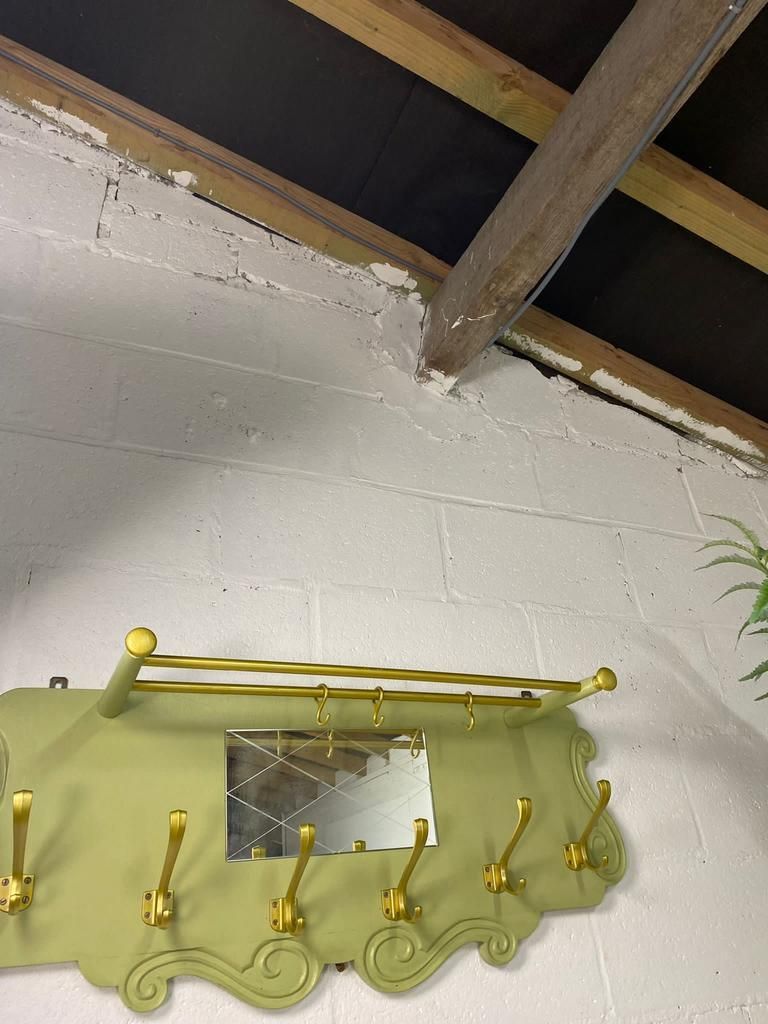 Vintage olive green wall coat rack with mirror