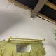 Vintage olive green wall coat rack with mirror
