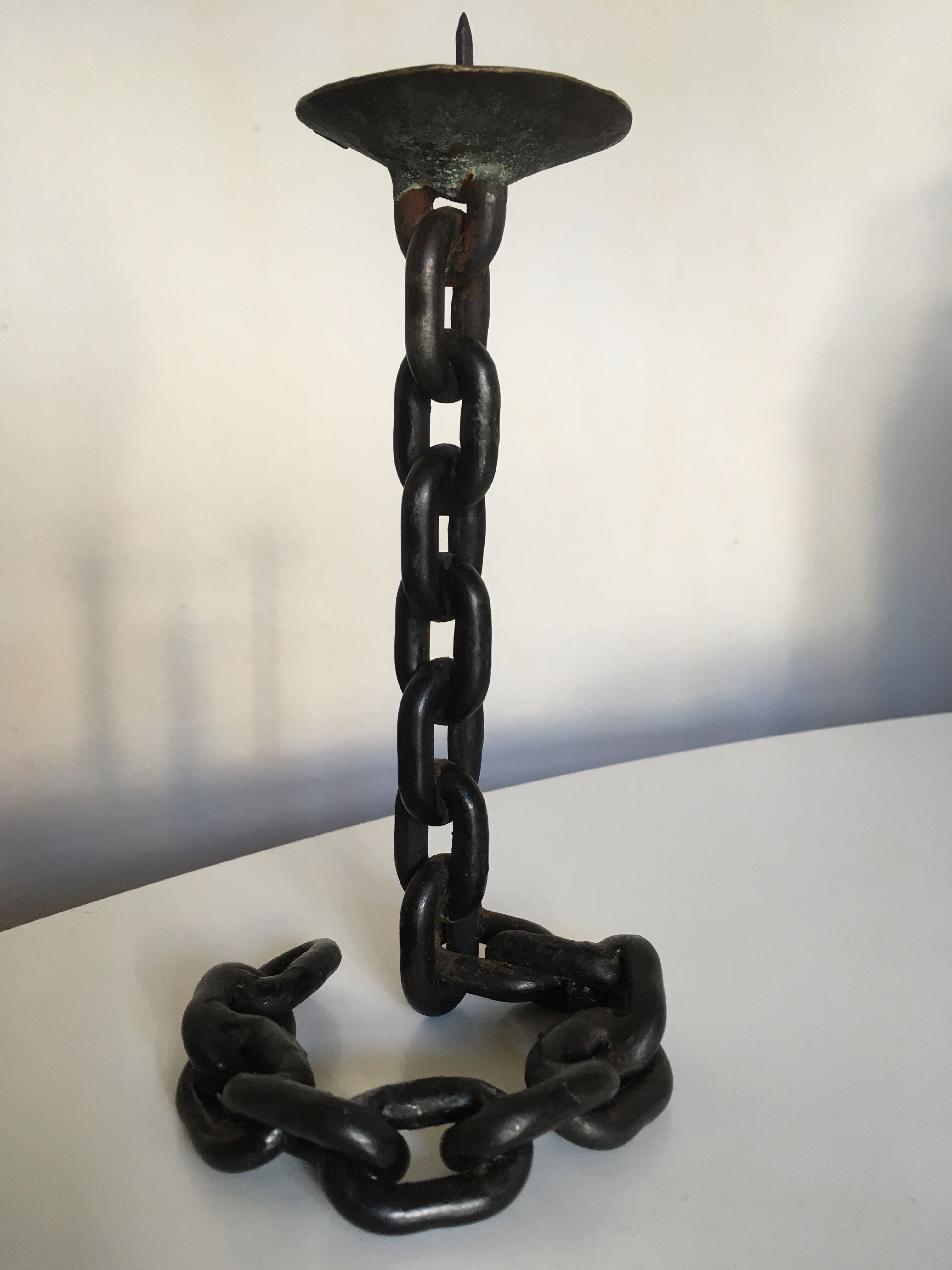 Candlestick with iron link chain and bronze cup