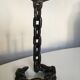 Candlestick with iron link chain and bronze cup