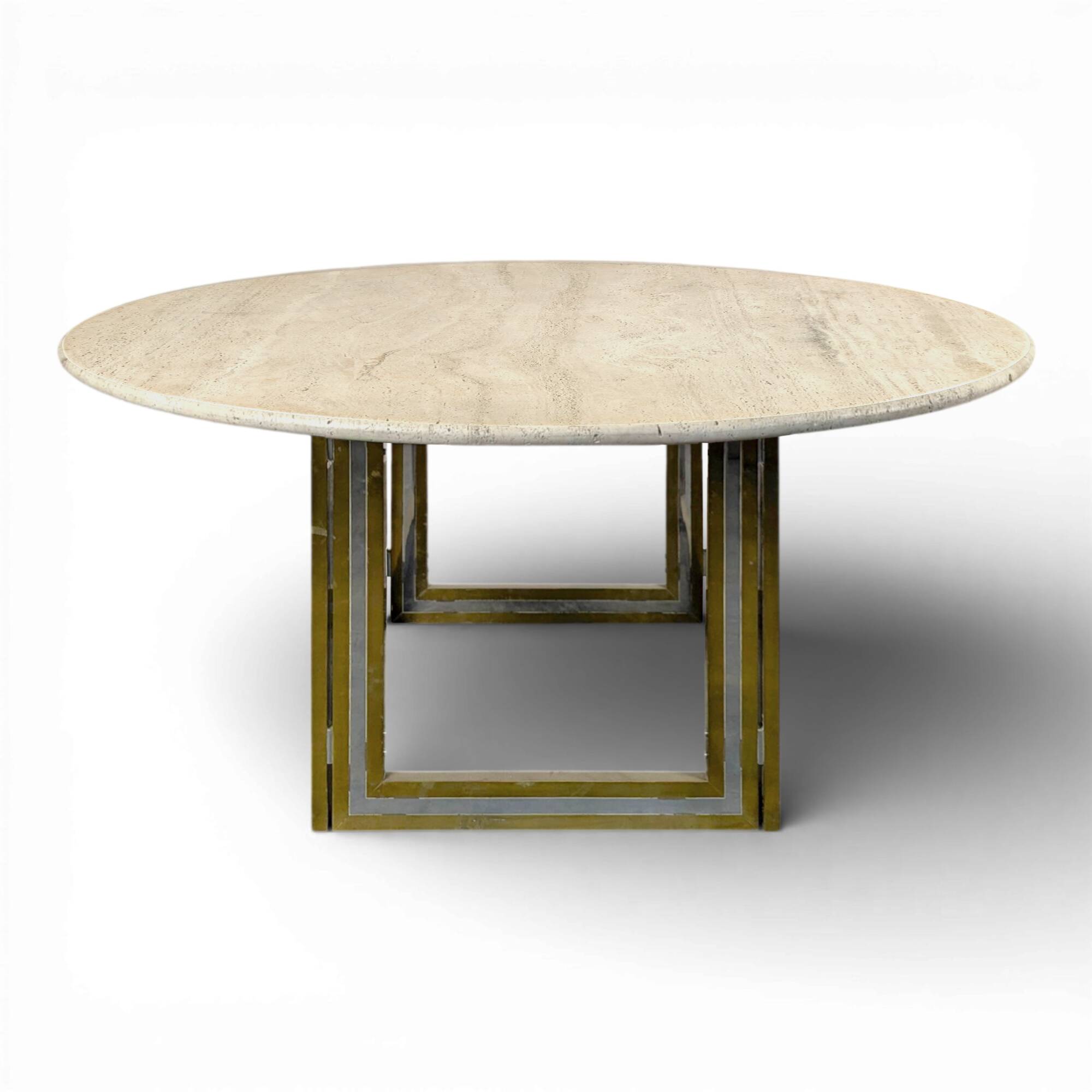 Italian dining table with a travertine top.