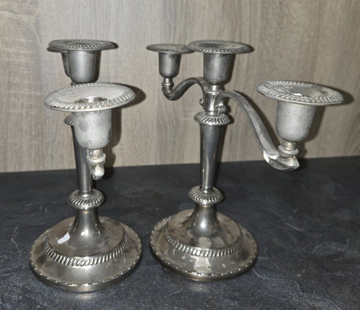 Pair of three-light candlesticks in silver-plated metal