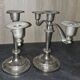 Pair of three-light candlesticks in silver-plated metal