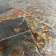 1970s Brutalist Round Coffee Table – Grey Slate Top with Copper-Tone Wrought Iron Frame