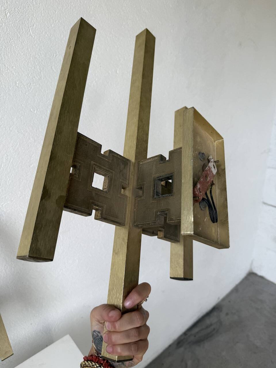 Pair of Regency brass wall lights in Italy