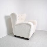 Fauteuil à oreille en bouclette