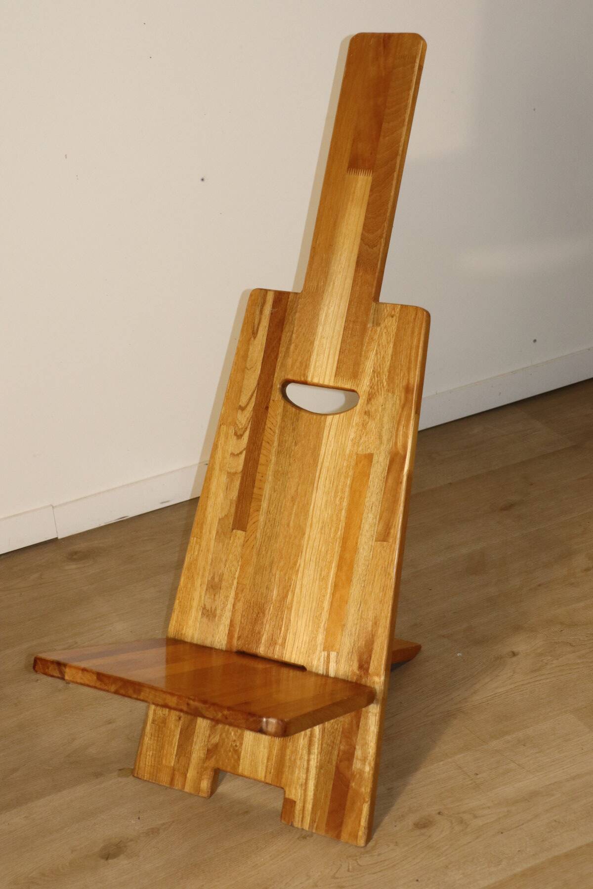Sculptural brutalist armchair in solid elm, 1980.