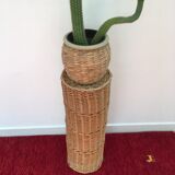 Vintage umbrella holder in wicker rattan