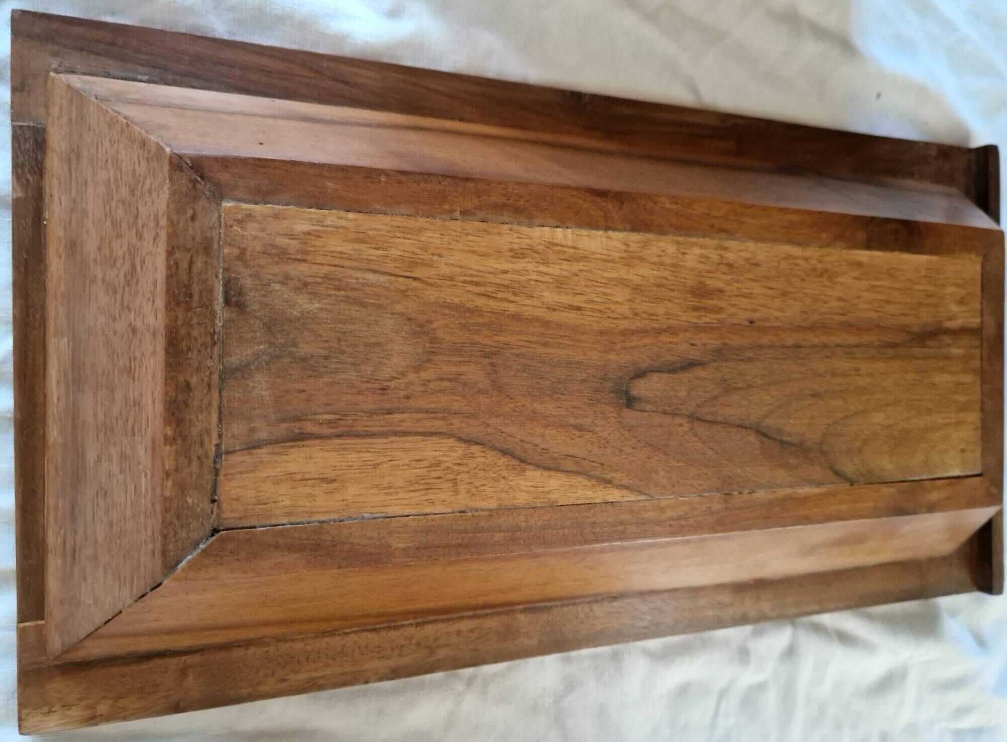 Nineteenth-century walnut work table with flaps, large storage + secret drawer.