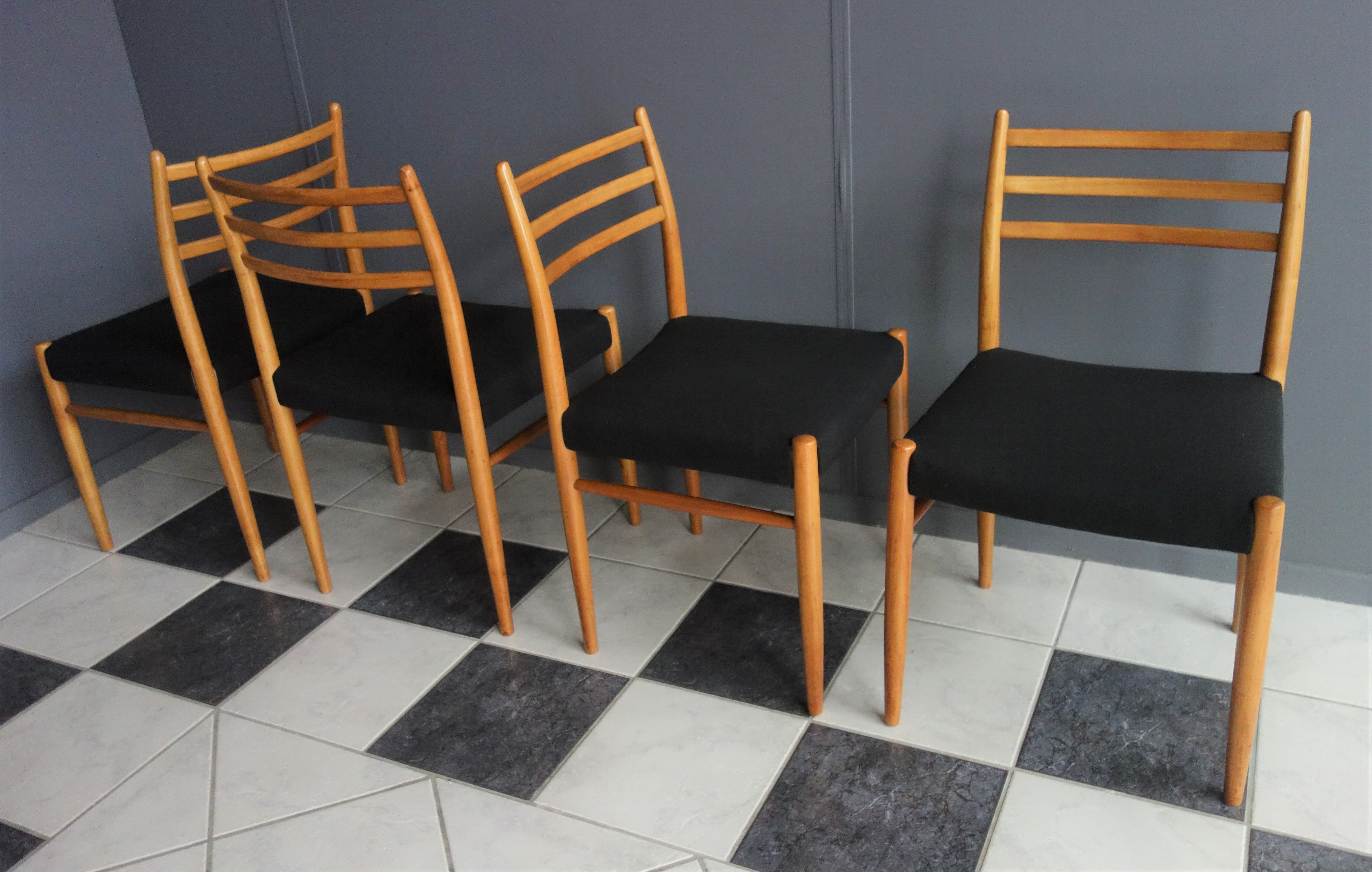 Set of 4 dining chairs in wood and black fabric 1960s