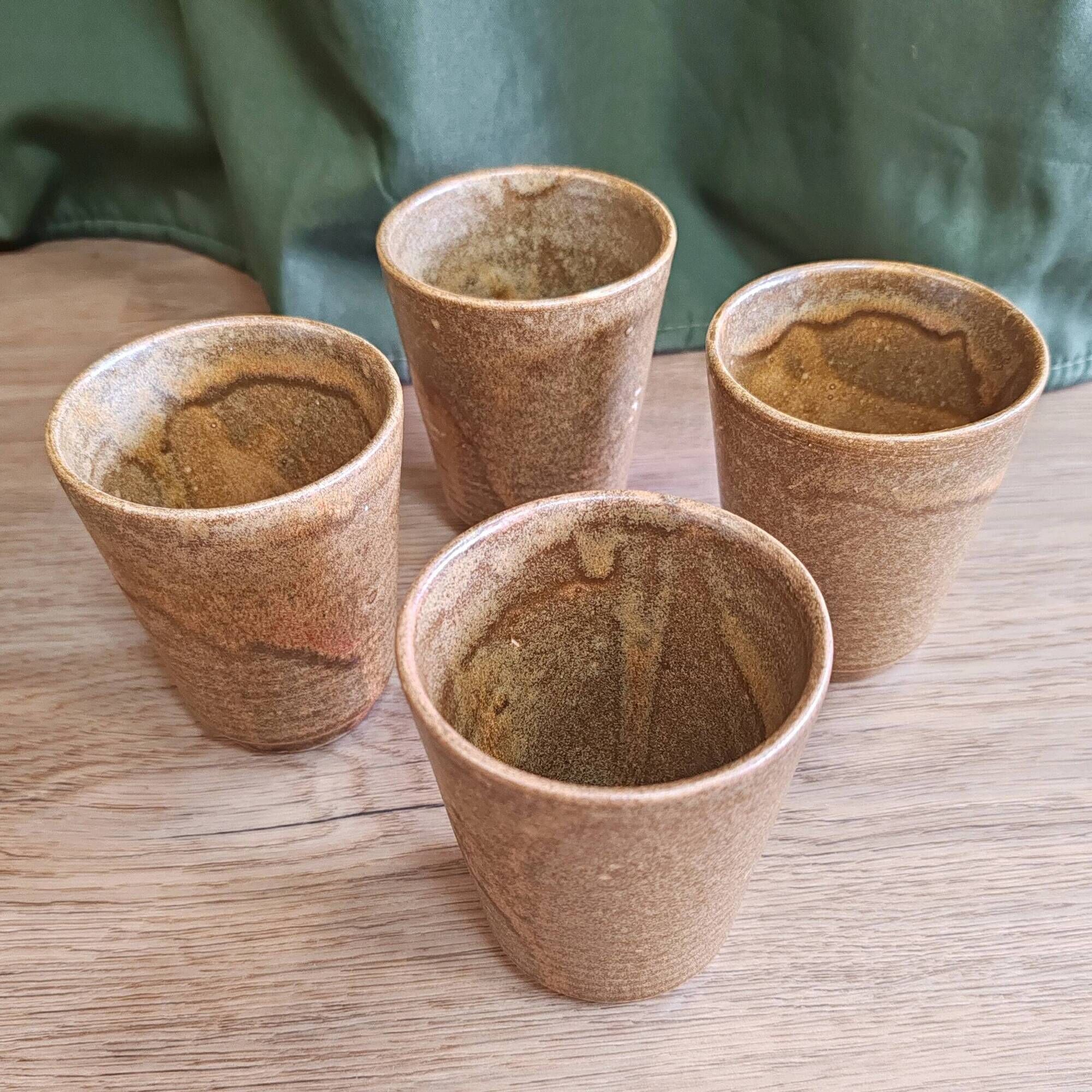 Four stoneware glasses "Digoin"
