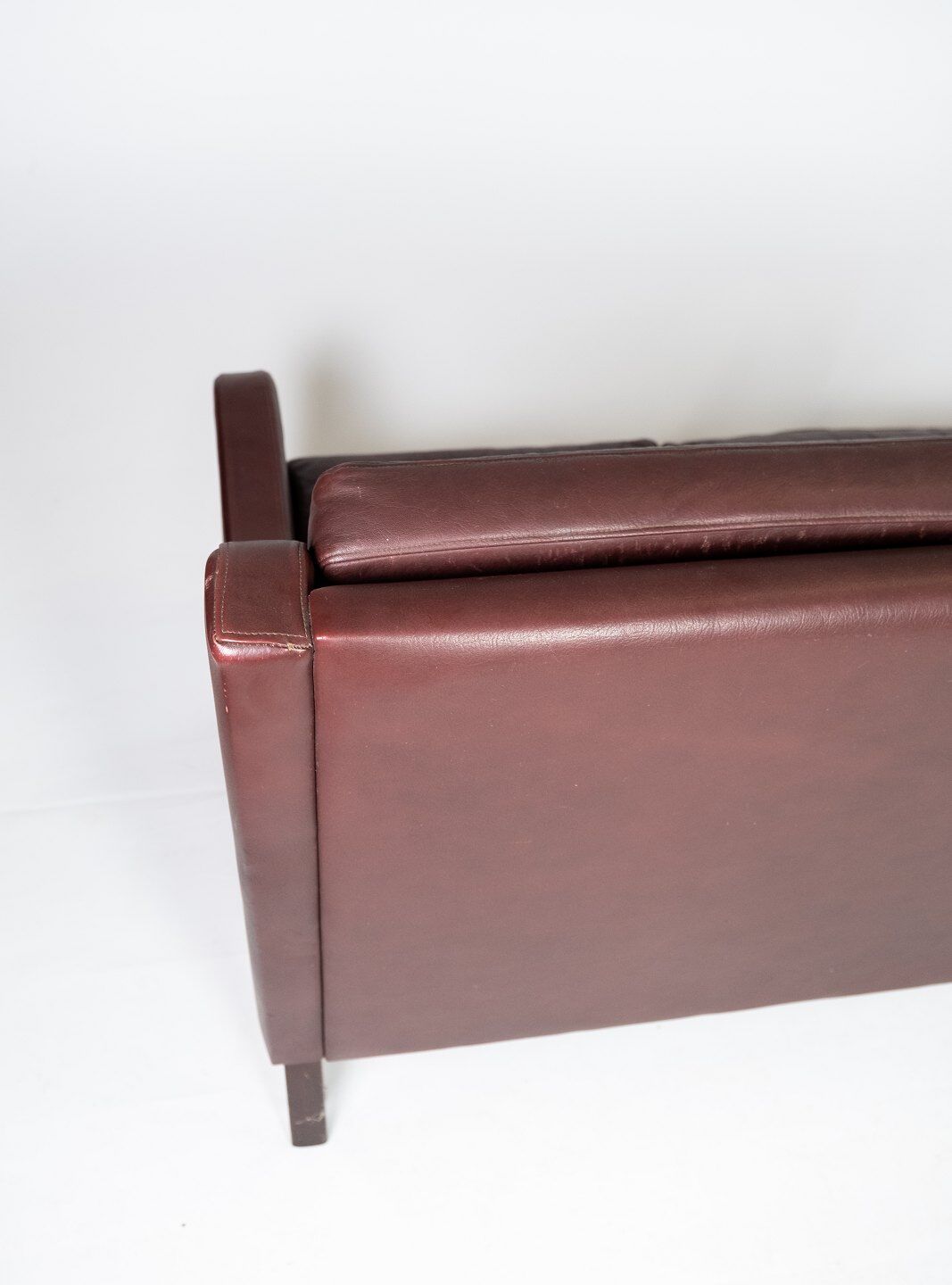 Three seater sofa, with red brown leather by Stouby Furniture from the 1960s