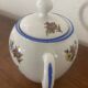 Large sugar bowl with floral porcelain.