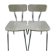 Pair of chairs in Formica effect wood veins and golden singing