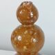 Unique vintage ceramic vase in the shape of a decorative sphere.