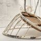 Basket armchair in metal and wood.