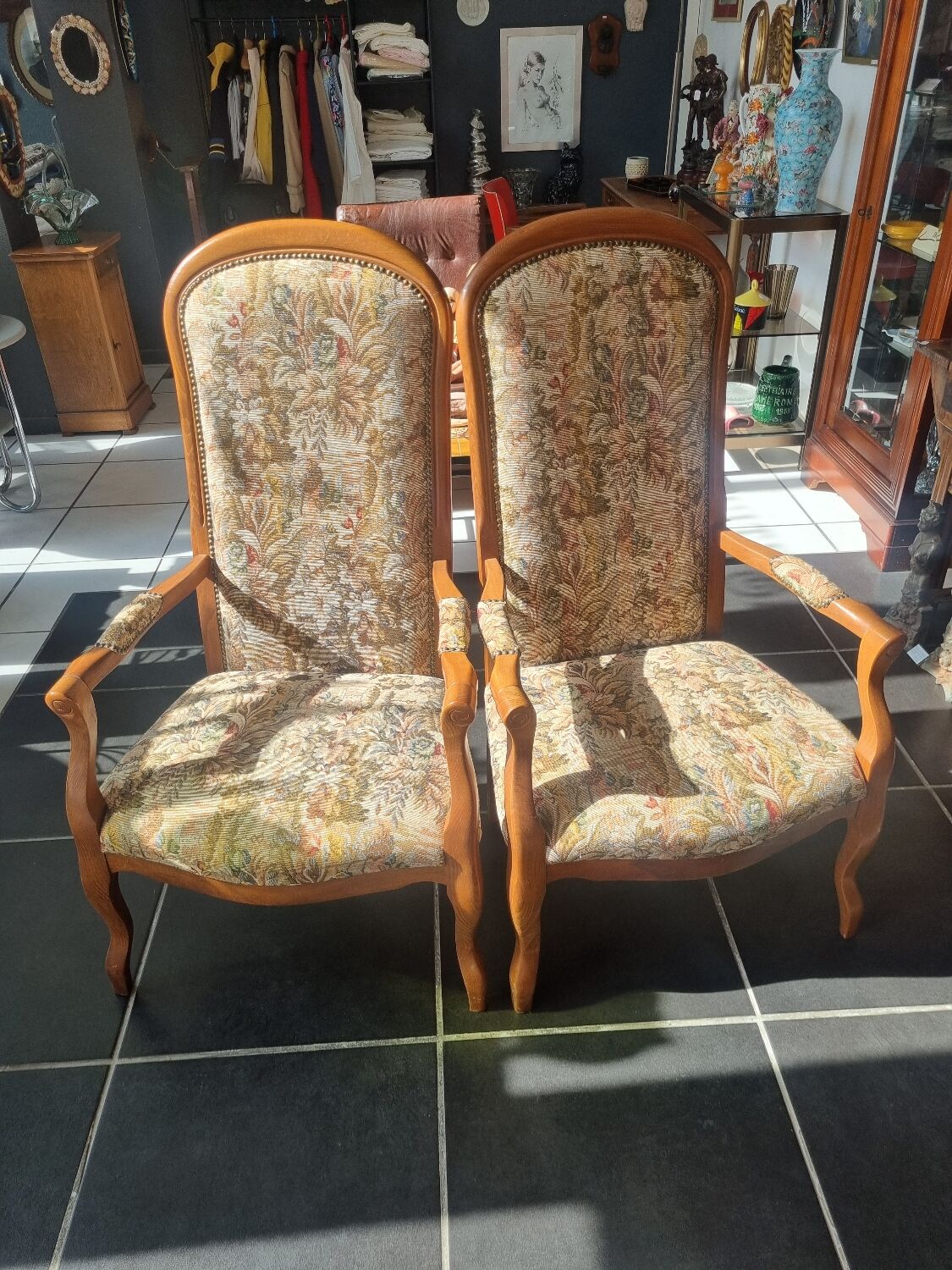 Pair of antique Voltaire armchairs
