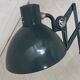 Vintage 1950s green lacquered sheet metal workshop wall light with accordion arm.