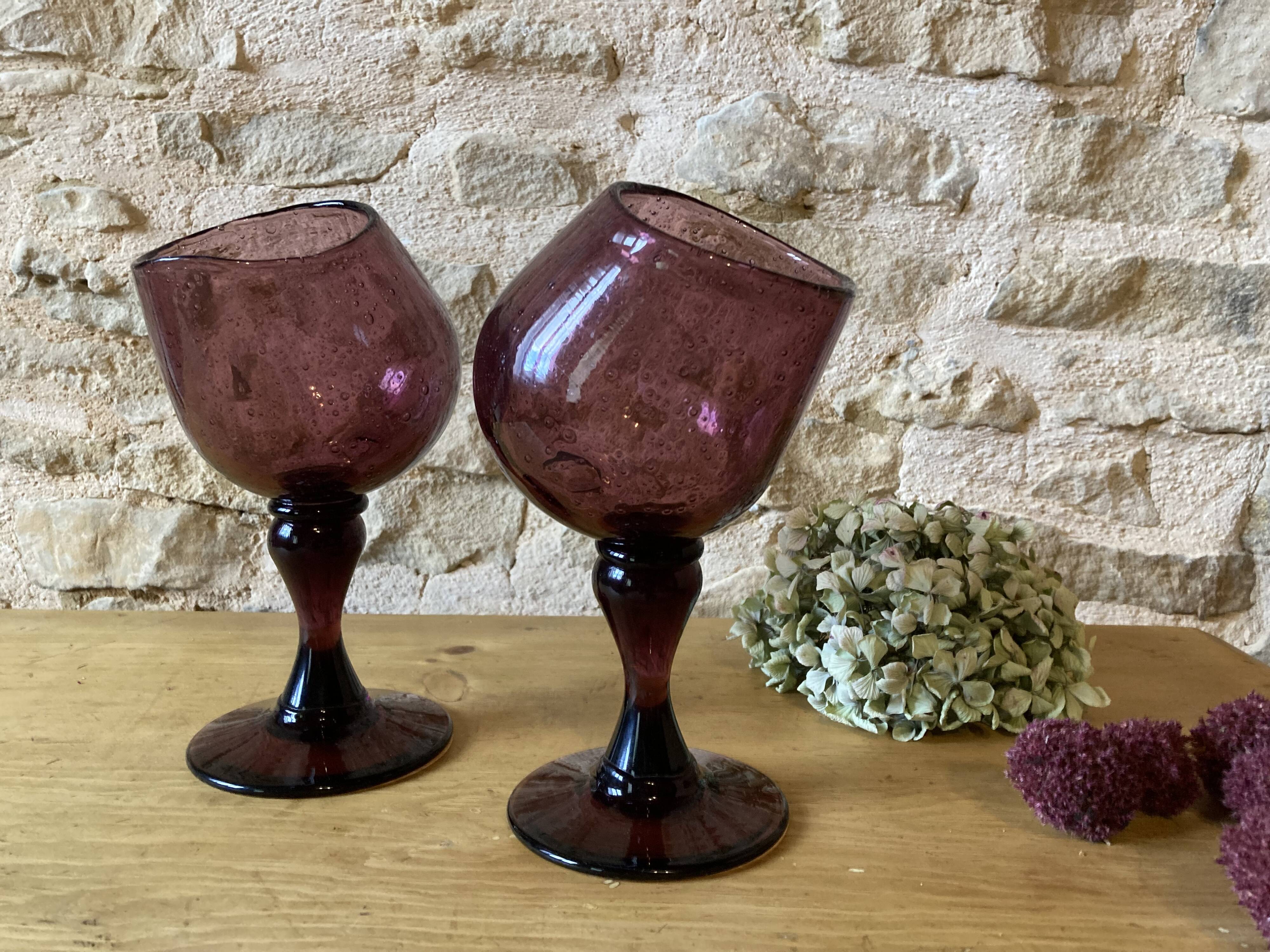 Duo of purple tinted bubbled glass cups