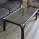 Bamboo coffee table with brass corners and smoked glass